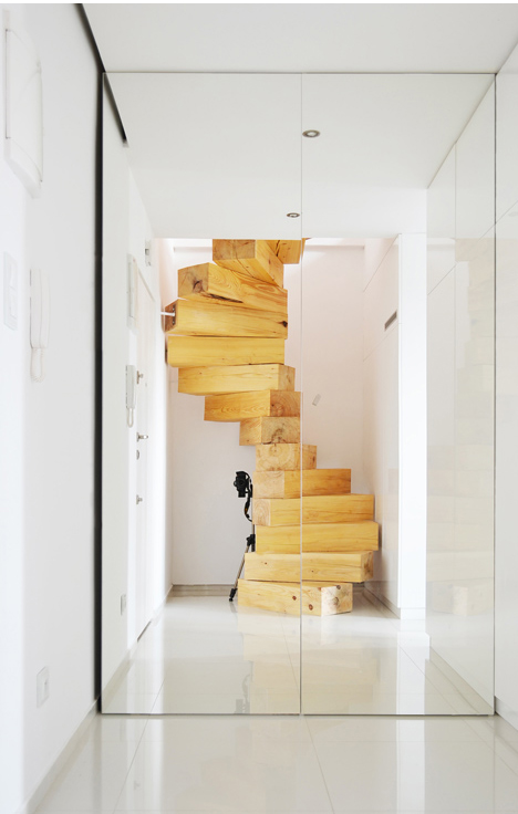 wood stairs entry mirror