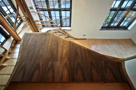 organic tree-like winding wooden stairs