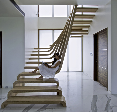curved waterfall wooden staircase