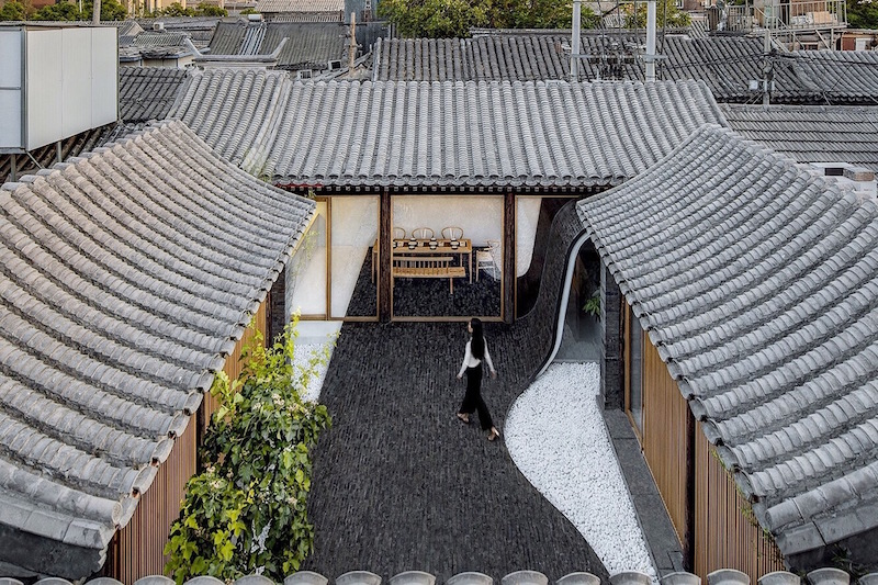 Curving Courtyard Floor “Makes Waves” in This Traditional Beijing Home